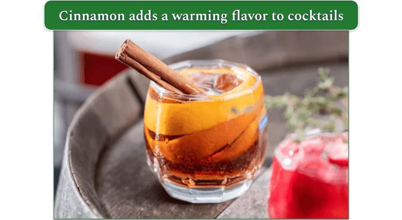Cocktail with a cinnamon stick in