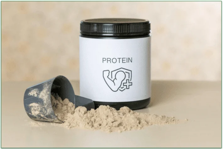A container of protein powder next to a half-empty scoop