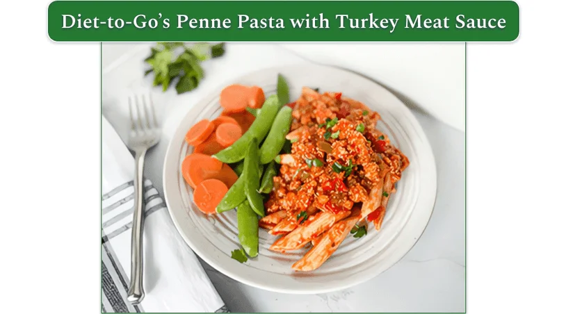 a screenshot of diet-to-go's penne pasta with turkey meat sauce from the balance menu