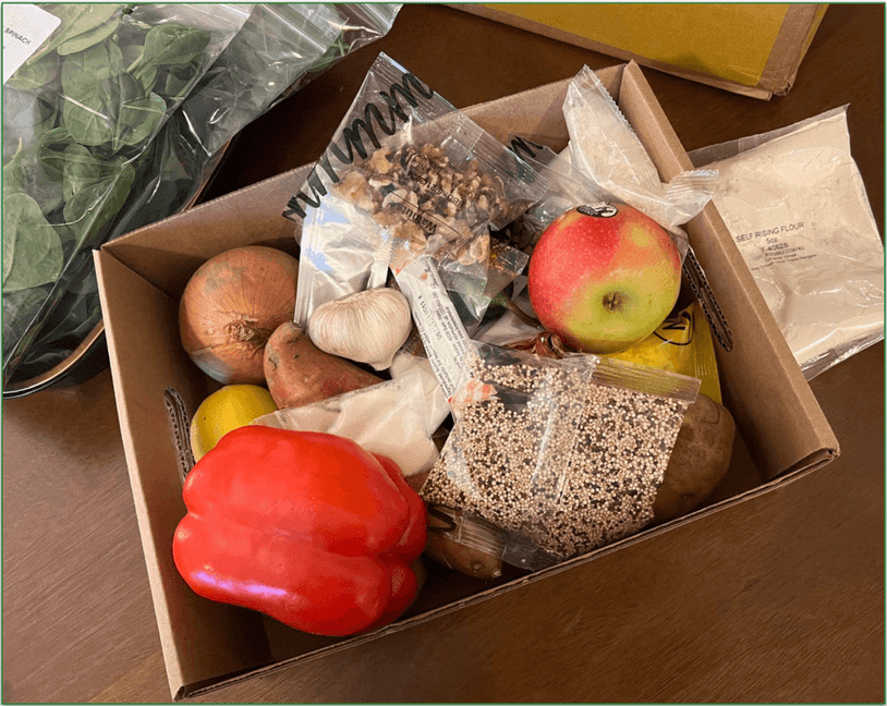 An open Marley Spoon box with dairy-free ingredients