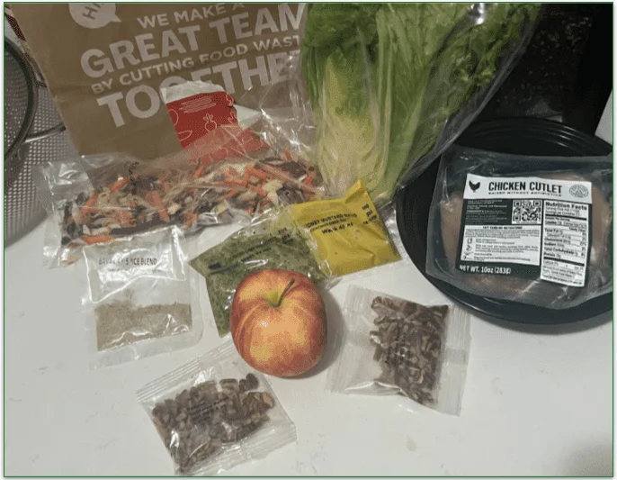 All of the many plastic-wrapped ingredients for a single recipe