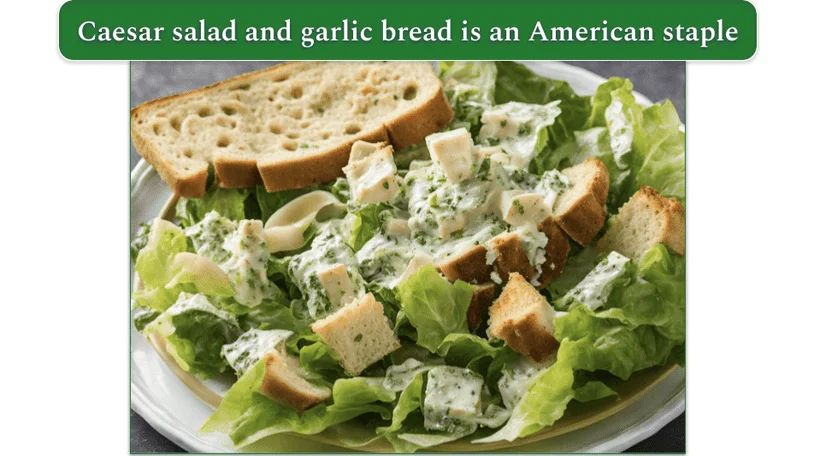 a plate of caesar salad accompanied by a slice of herby garlic bread