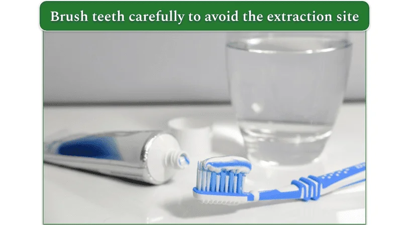 Toothbrush, toothpaste, and a glass of water
