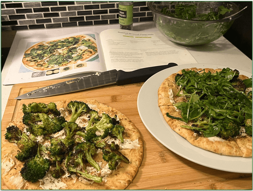 Purple Carrot meal kit with recipe card on a chopping board