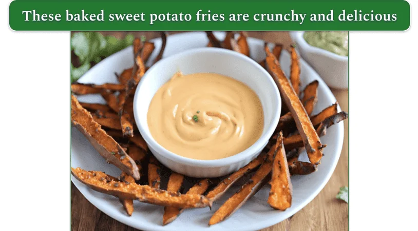 a plate of baked sweet potato fries with a bowl of chipotle lime aioli