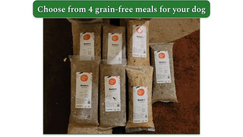 Image showing 7 food packages from TFD with the name of the dog at the front and guidelines of how much to feed per day