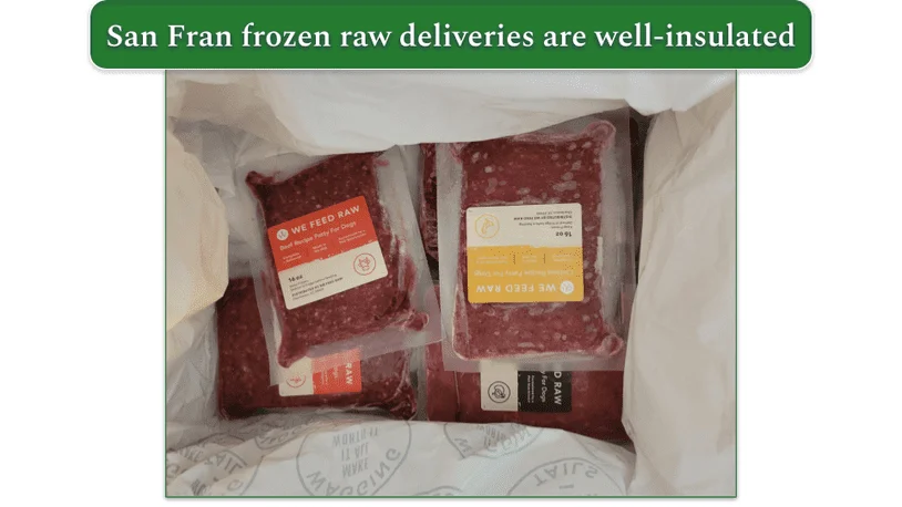 Open We Feed Raw delivery box with frozen packs