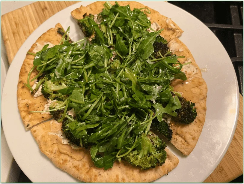Roasted Broccoli Flatbreads with Cashew Cream Cheese and Arugula by Purple Carrot