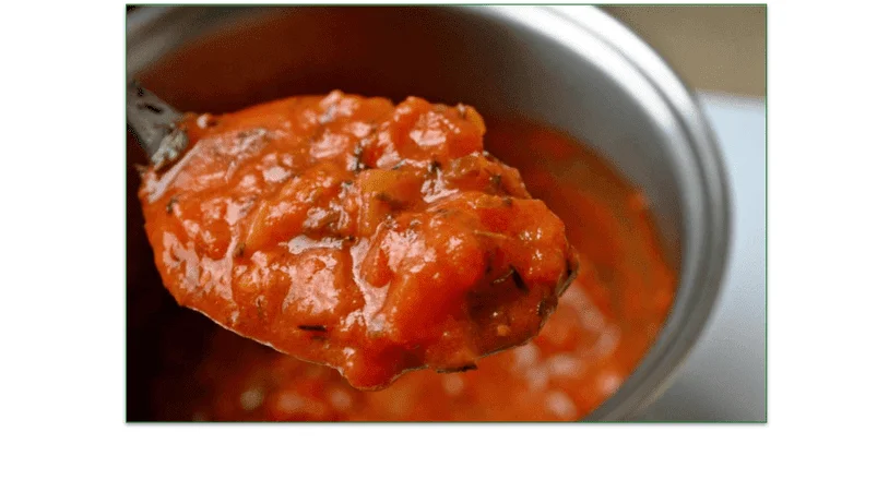 Tomato soup in the pot, being cooked