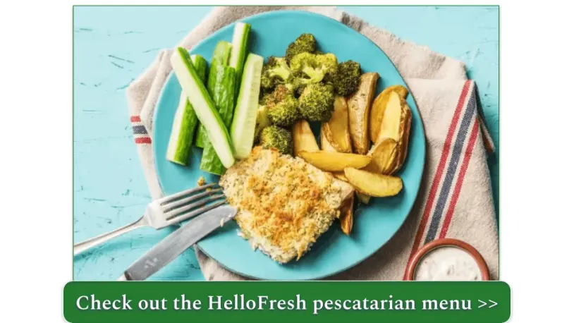 A plate of fish and chips with broccoli and pickles