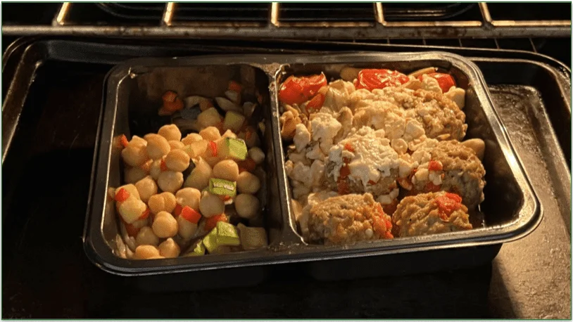 Tempo's Saucy Beef Meatballs dish placed on a tray in the oven